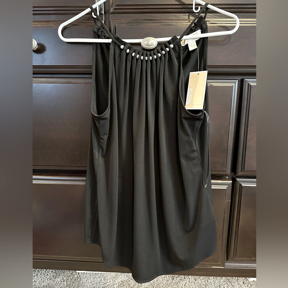 Michael Kors. NWT. Black. Sleeveless. Neck tie in back. Size small